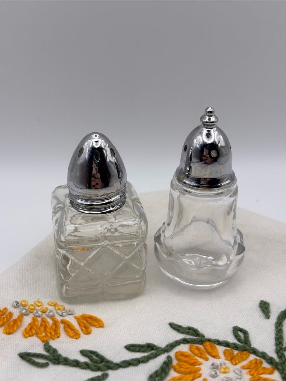 Set of Mismatch Glass and Silver Salt and Pepper Shakers